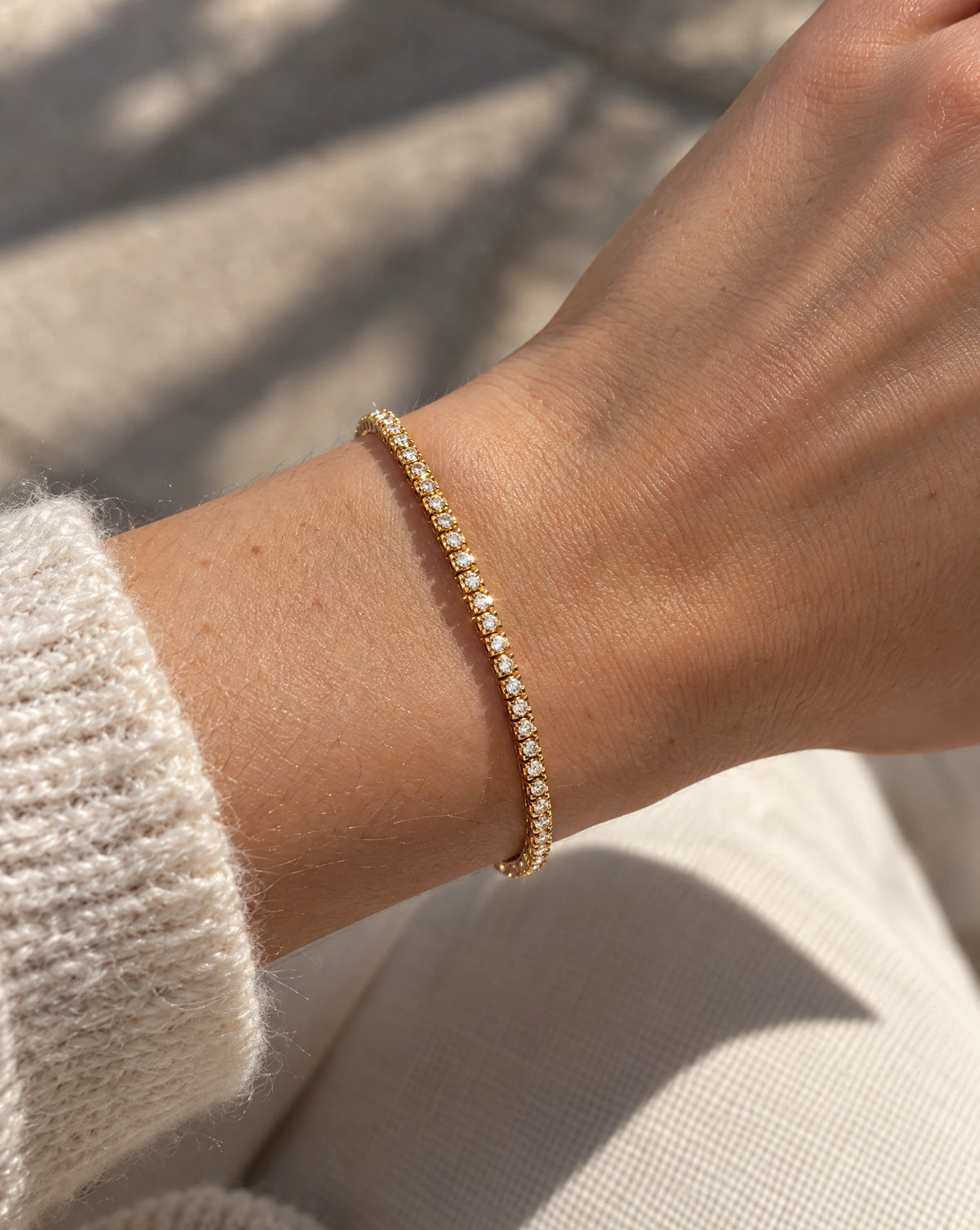 Grand tennisarmband 0,75 ct i 18K rödguld