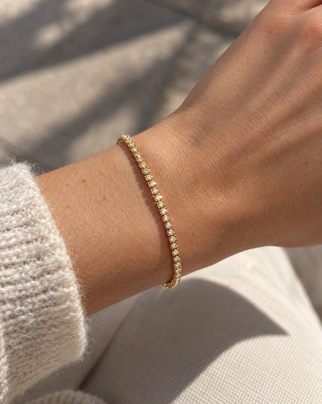 Grand tennisarmband 0,75 ct i 18K rödguld