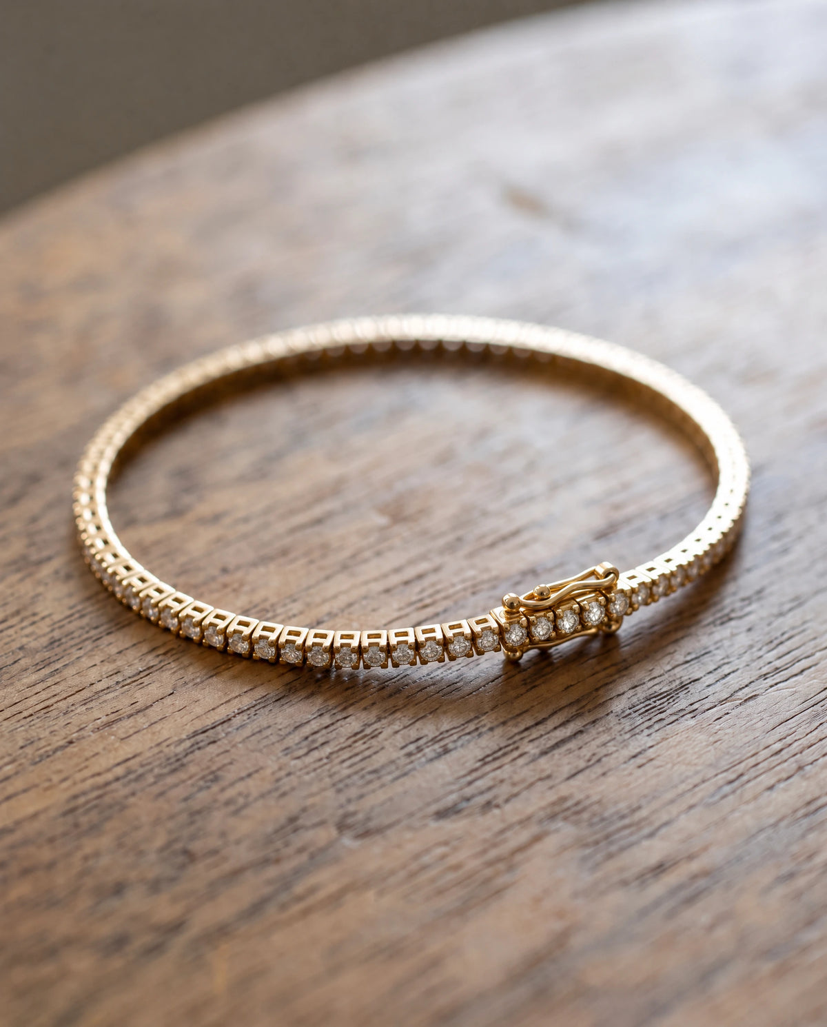 Grand tennisarmband 0,75 ct i 18K rödguld