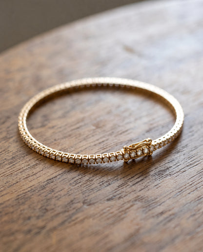 Grand tennisarmband 0,75 ct i 18K rödguld