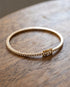 Grand tennisarmband 0,75 ct i 18K rödguld