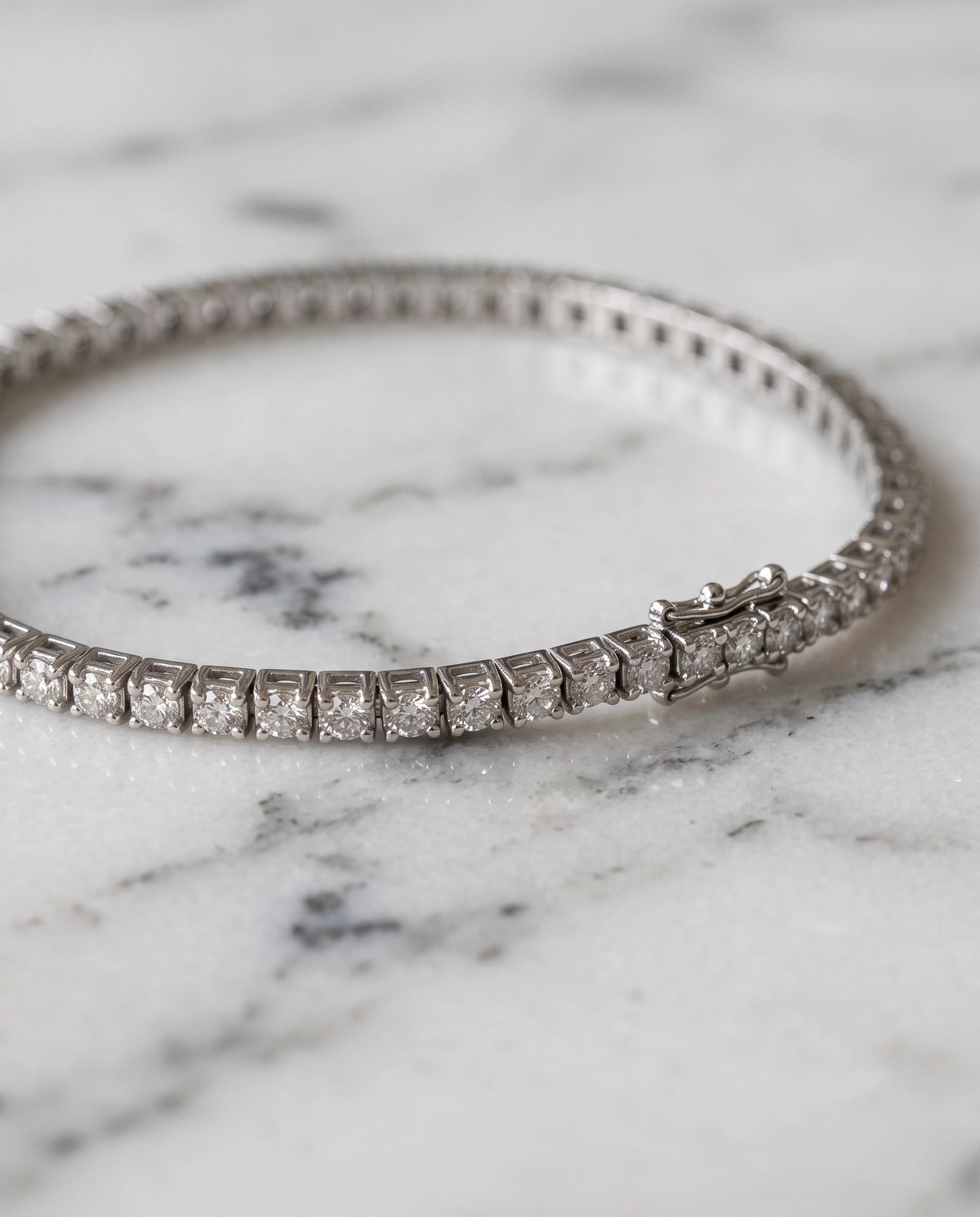Grand tennisarmband 1,60 ct i 18K vitguld