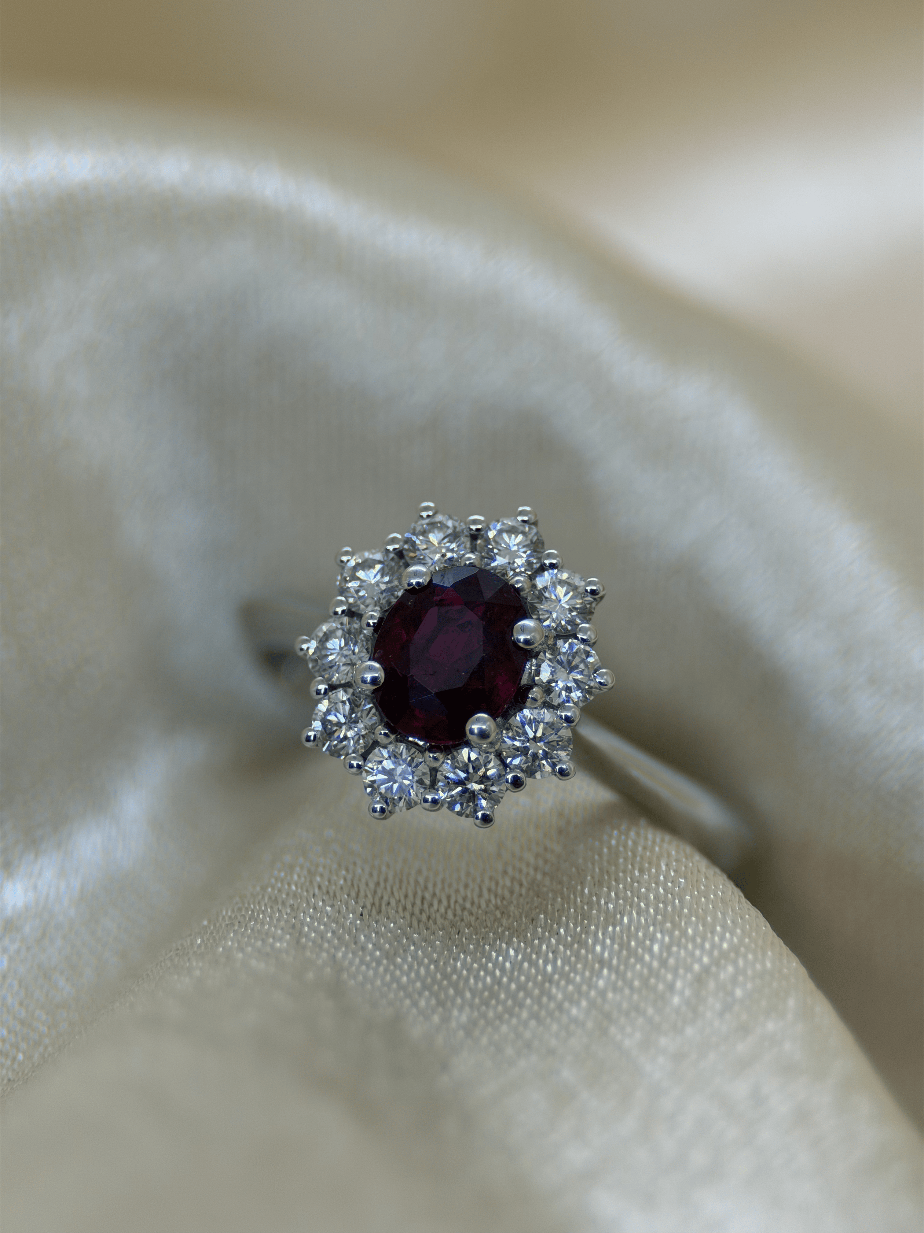 Oval Ruby &amp; Diamond Halo Ring in 18K White Gold – 0.64 ct